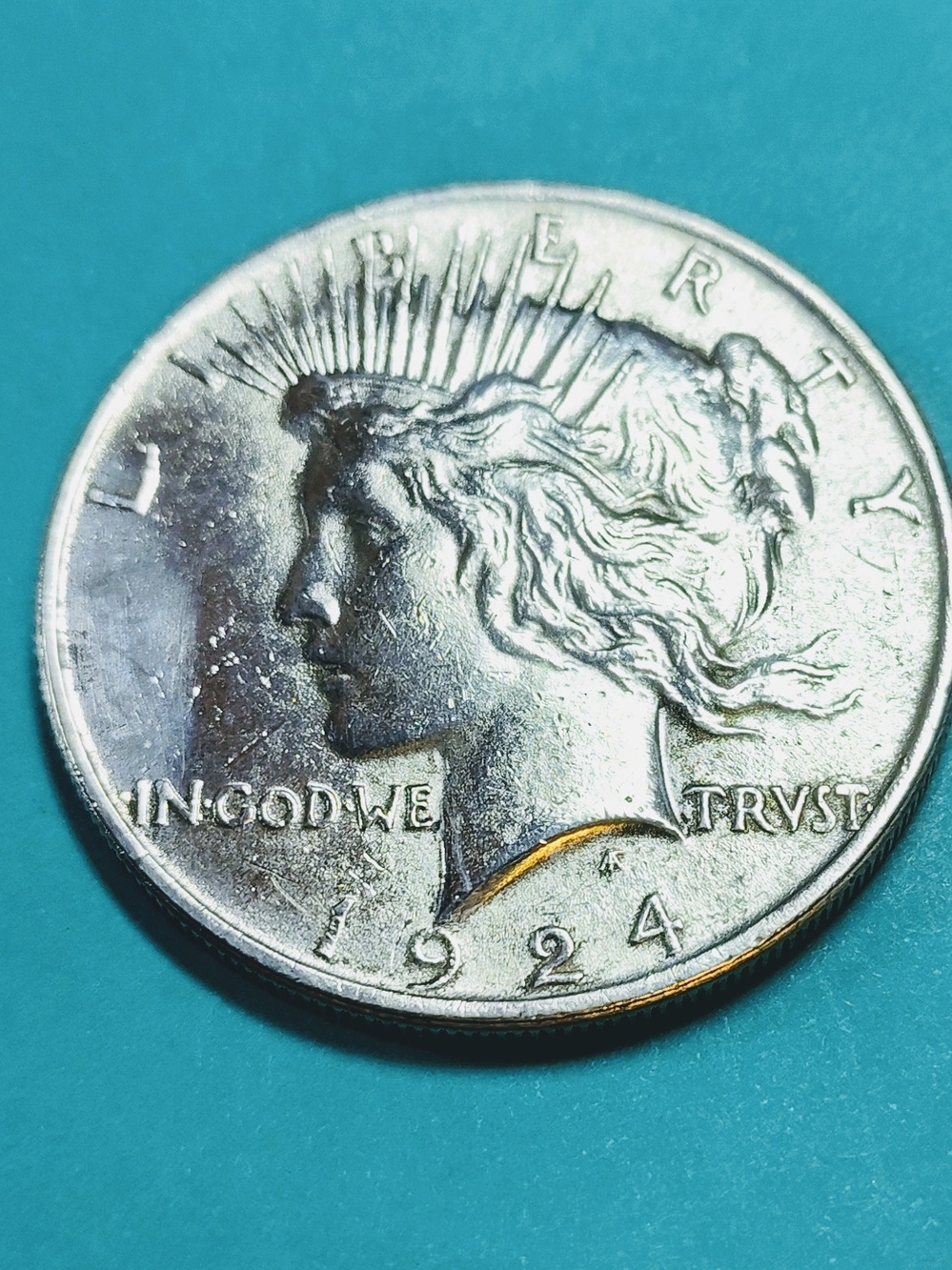 1924 Peace Silver Dollar - Silver Tone In Good Circulated Condition.